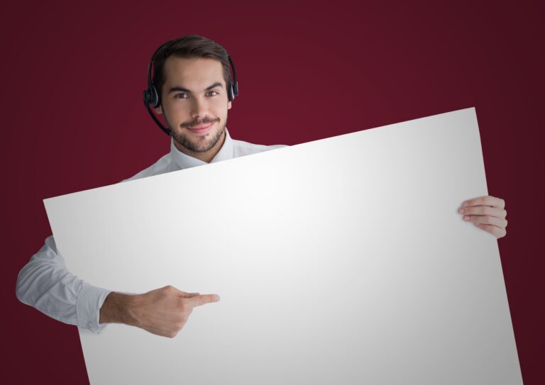customer-service-man-with-large-blank-card-against-maroon-background