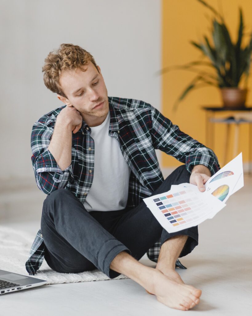 front-view-man-planning-redecorating-household