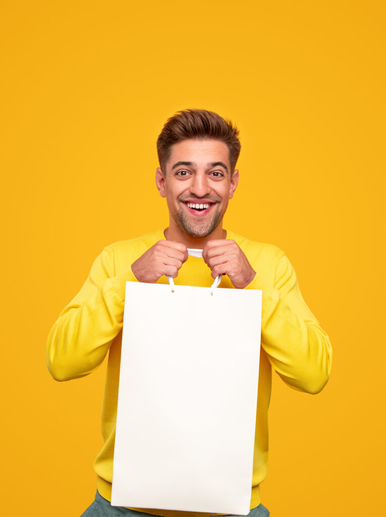 happy-man-with-white-paper-bag